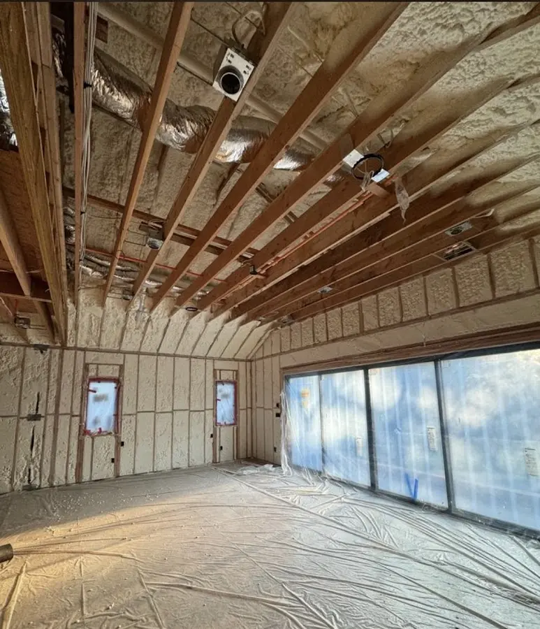 Interior walls and ceiling insulated with spray foam during new construction in Eagle Point